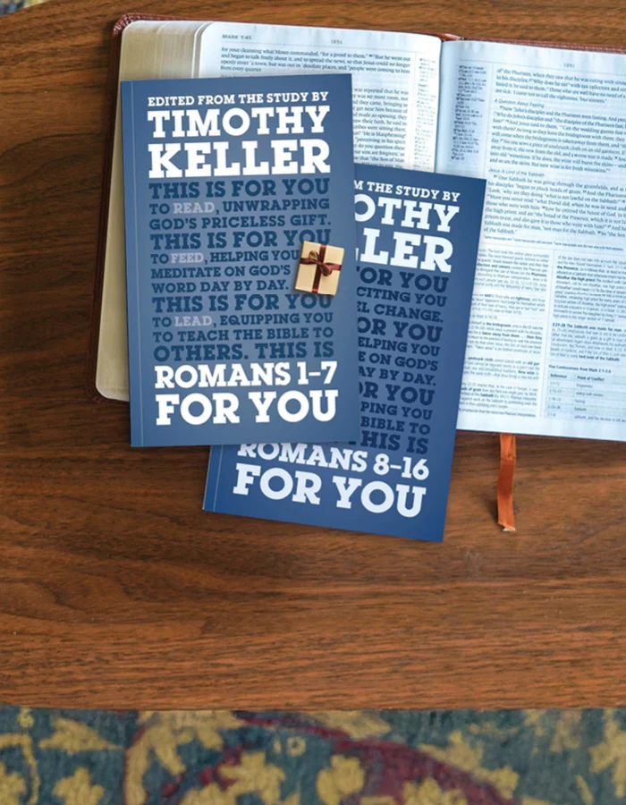 Photograph of Romans 1-7 For You and Romans 8-16 For You on an open Bible