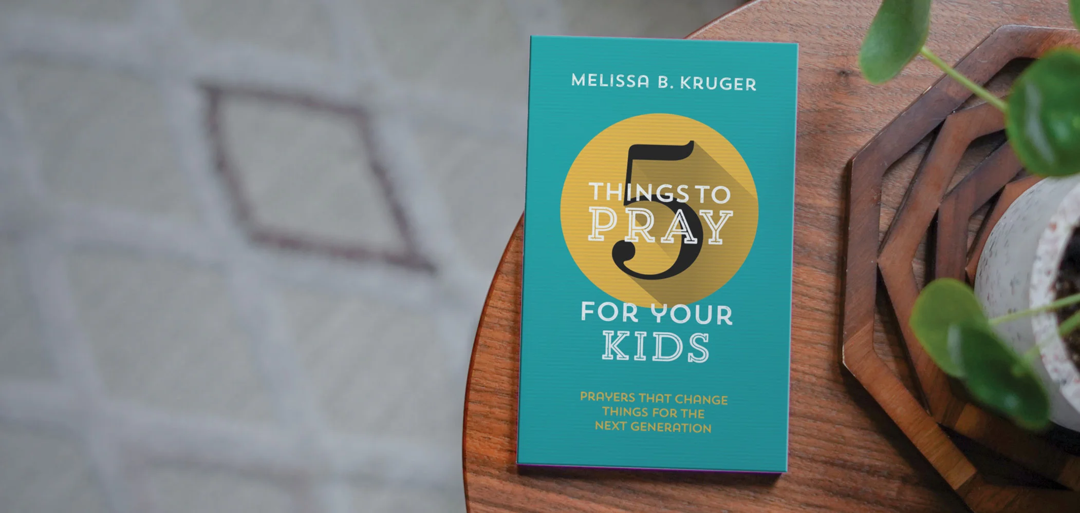 Photograph of 5 Things to Pray for Your Kids on a wooden table