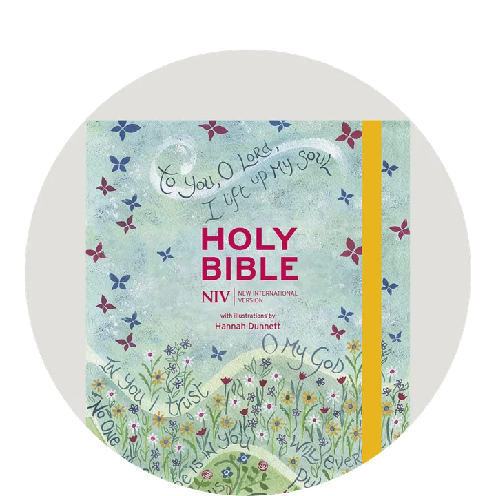 Graphic featuring a blue Bible with a scene with butterflies and a yellow elastic strap