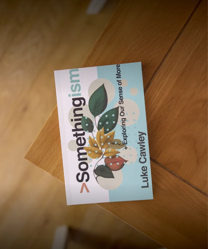 Photograph of Somethingism by Luke Cawley on a wooden table