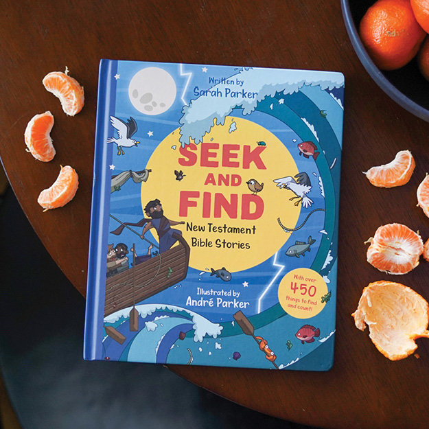Photograph of Seek and Find: New Testament Bible Stories with some orange slices near a bowl of oranges